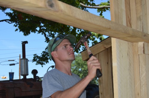 Matt working on the outhouse project.