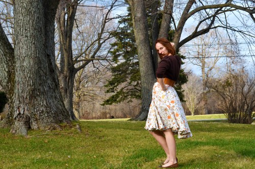 tea party dress paired with cardigan and belt