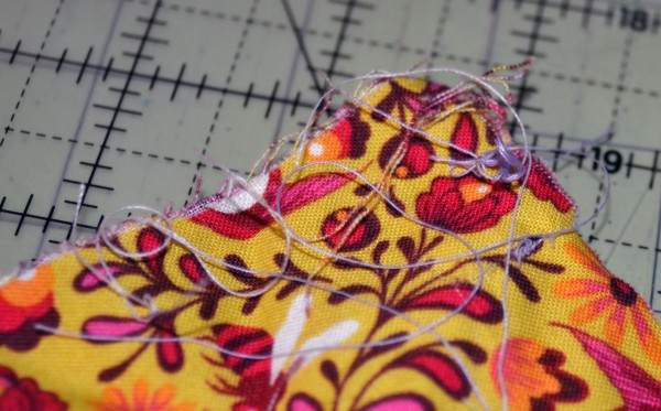 thread nest on fabric