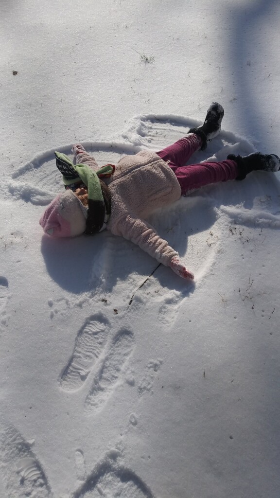 Mil makes snow angels